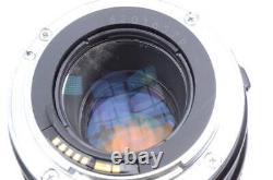 Objectif à focale fixe Canon EF 100mm f/2.8 avec bouchons avant et arrière pour appareil photo reflex numérique