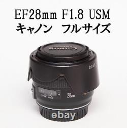Objectif à focale fixe Canon EF28mm F1.8 USM en taille réelle.