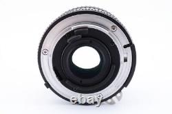 Objectif à focale fixe grand angle manuel Nikon Ai s NIKKOR 24mm f/2.8 avec bouchons
