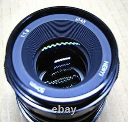 Objectif chinois à focale unique Newyi 50mm F1.8 avec monture Canon EOS M de grand diamètre, convient pour travaux.