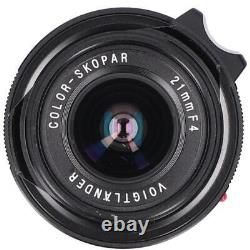 Objectif grand angle à focale fixe Voightlander COLOR SKOPAR 21mm F4 utilisé avec bouchon